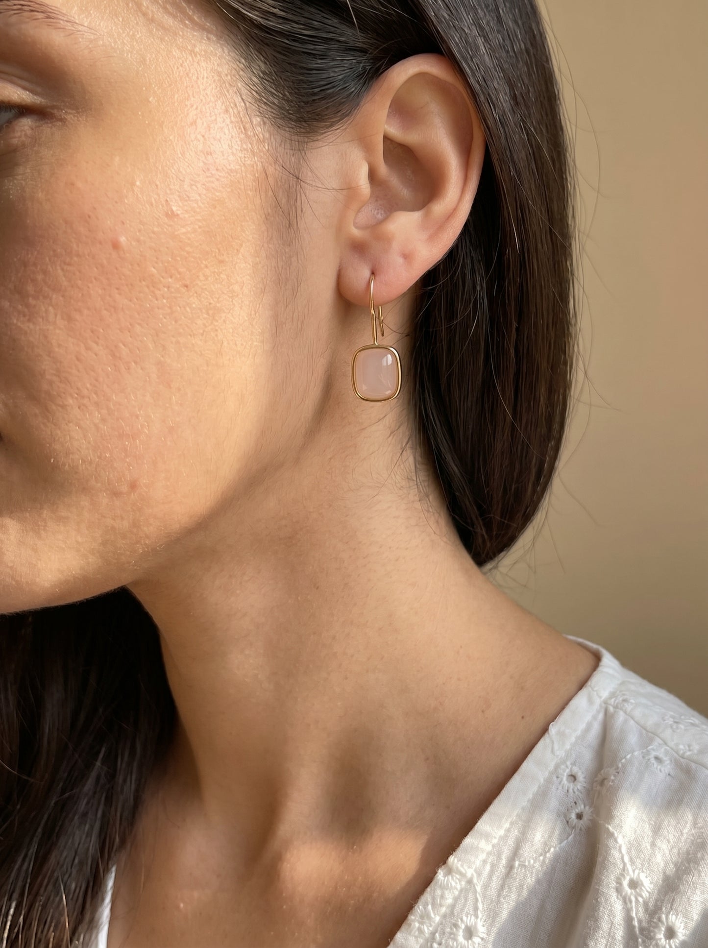 Rose quartz and gold hook earrings styled on model – lightweight everyday jewellery by StoneCraft Jewellery