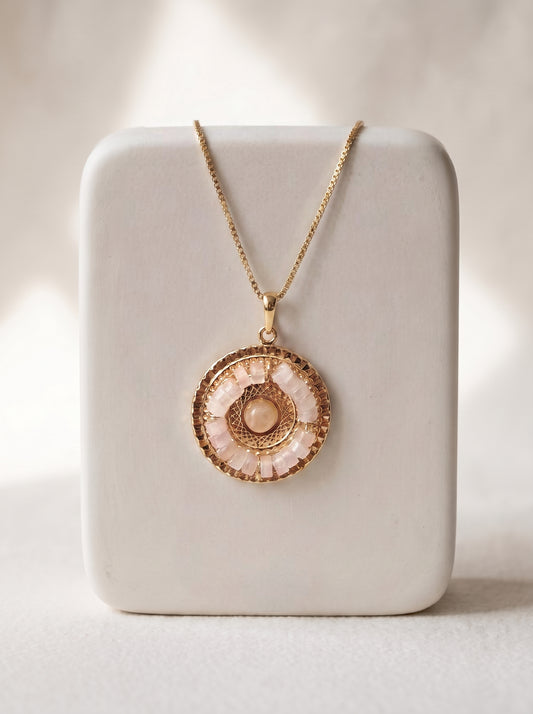 Rose Quartz Mandala gold-plated pendant necklace on white jewellery stand — StoneCraft Jewellery
