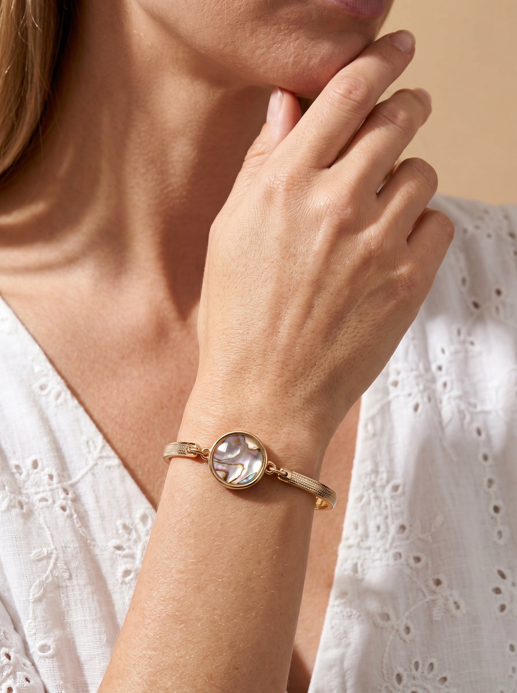 Gold and rhodium-plated abalone bracelet, new lifestyle image — StoneCraft Jewellery