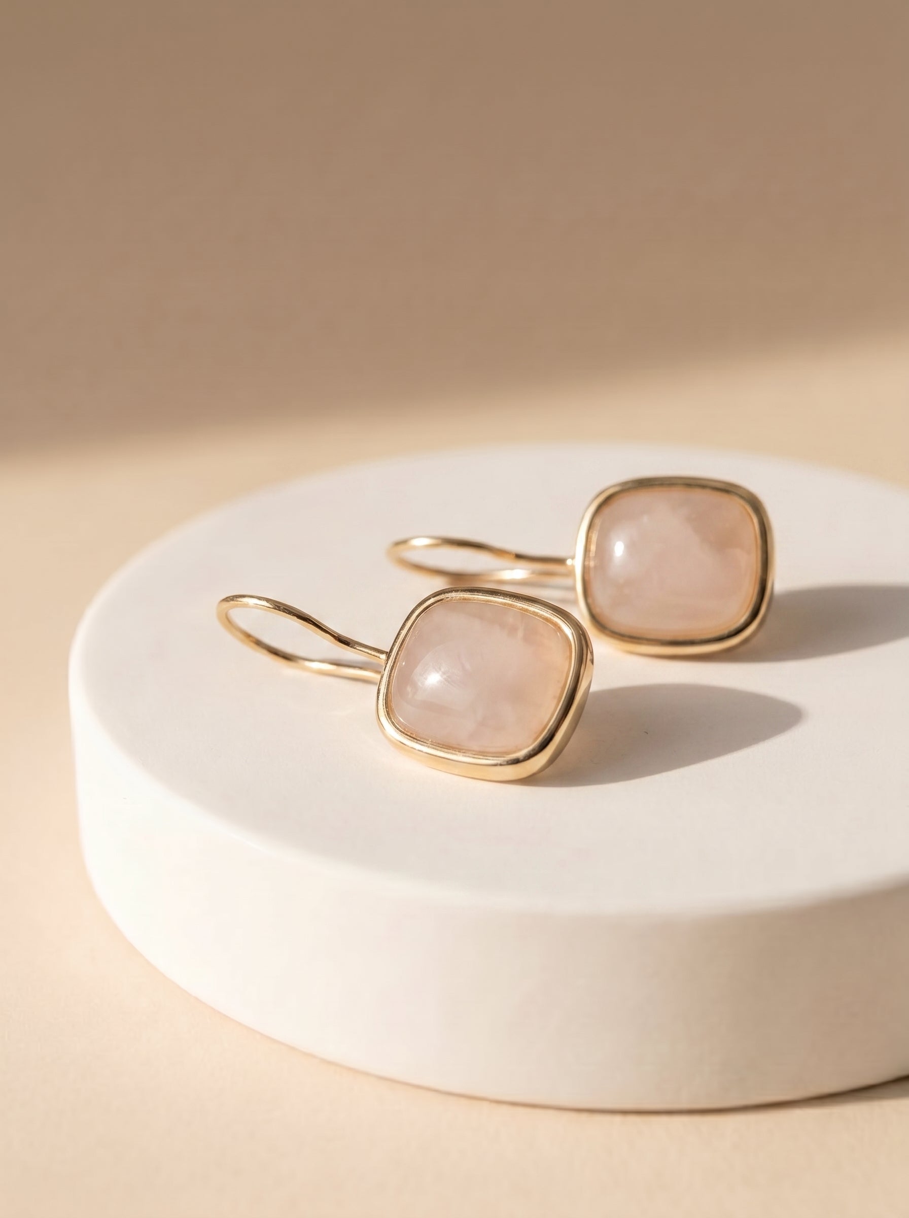  Rose quartz hook gold plated earrings by StoneCraft Jewellery – front view showing blush-pink stone and gold setting