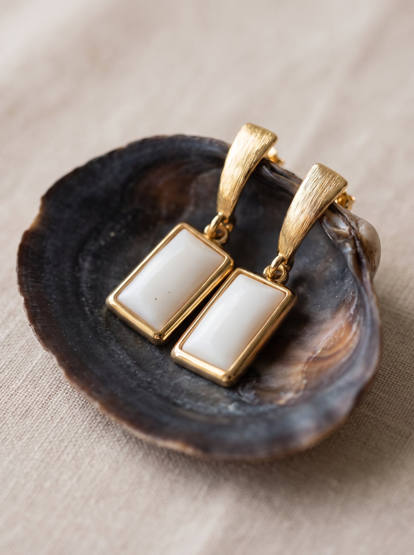 Mother-of-Pearl Rectangle Drop Earrings on oyster shell, gold brushed stud top with rectangular mother-of-pearl pendant