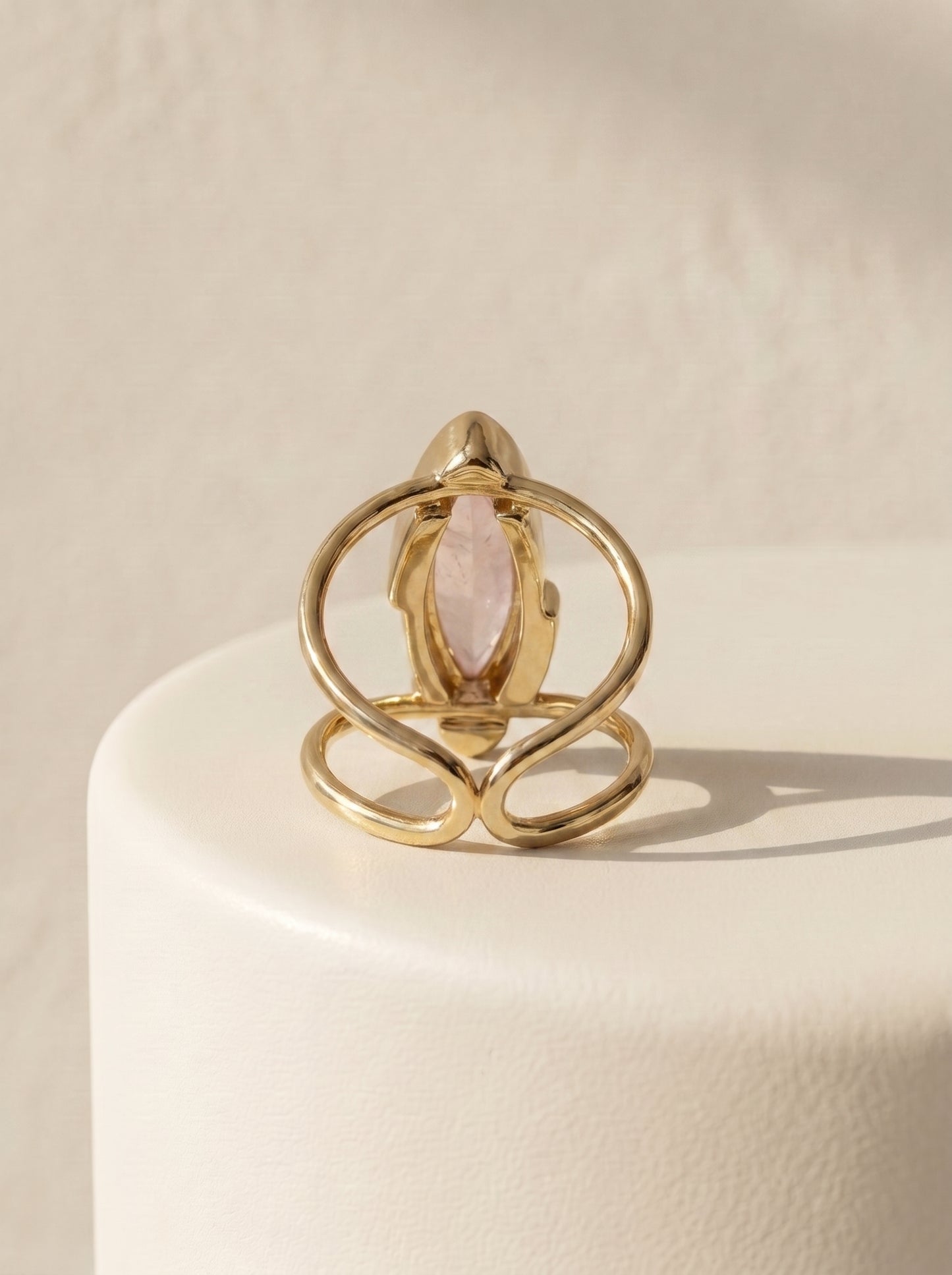 StoneCraft Jewellery rose quartz marquise cuff ring gold plated back view on white surface