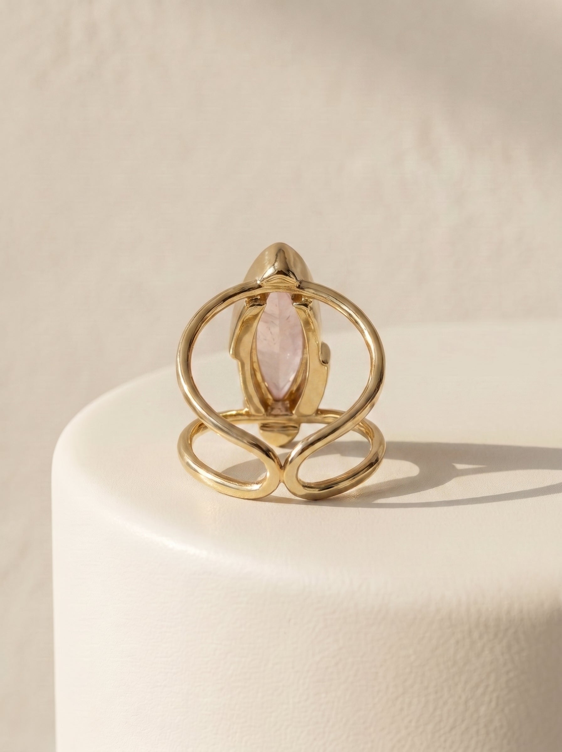 StoneCraft Jewellery rose quartz marquise cuff ring gold plated back view on white surface