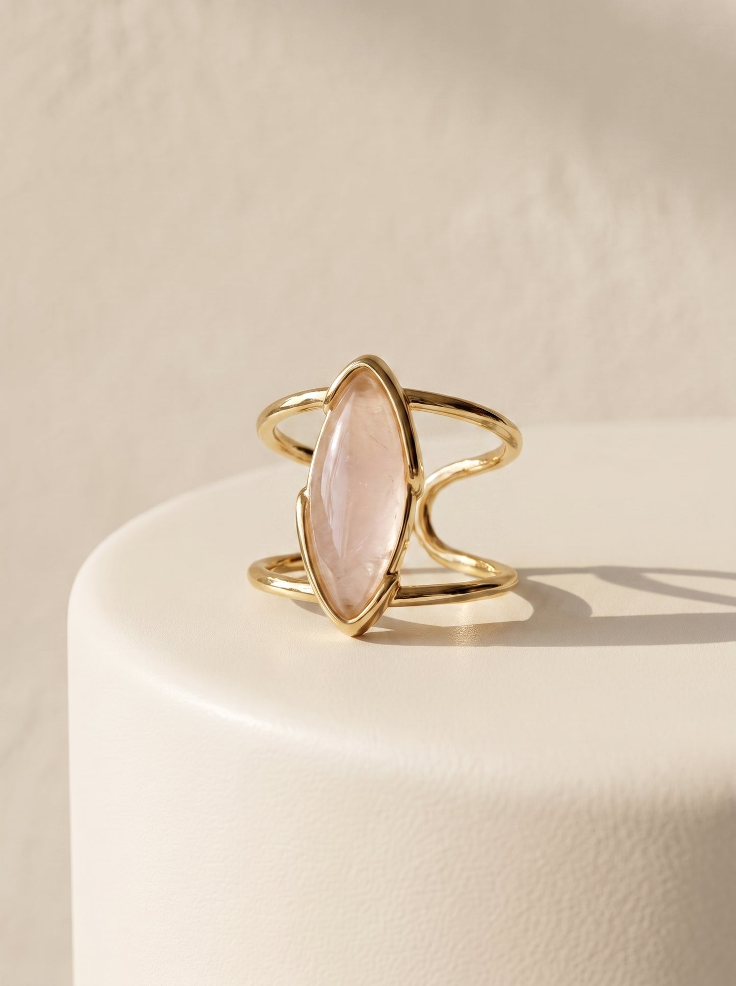 StoneCraft Jewellery rose quartz marquise cuff ring gold plated front view on white surface