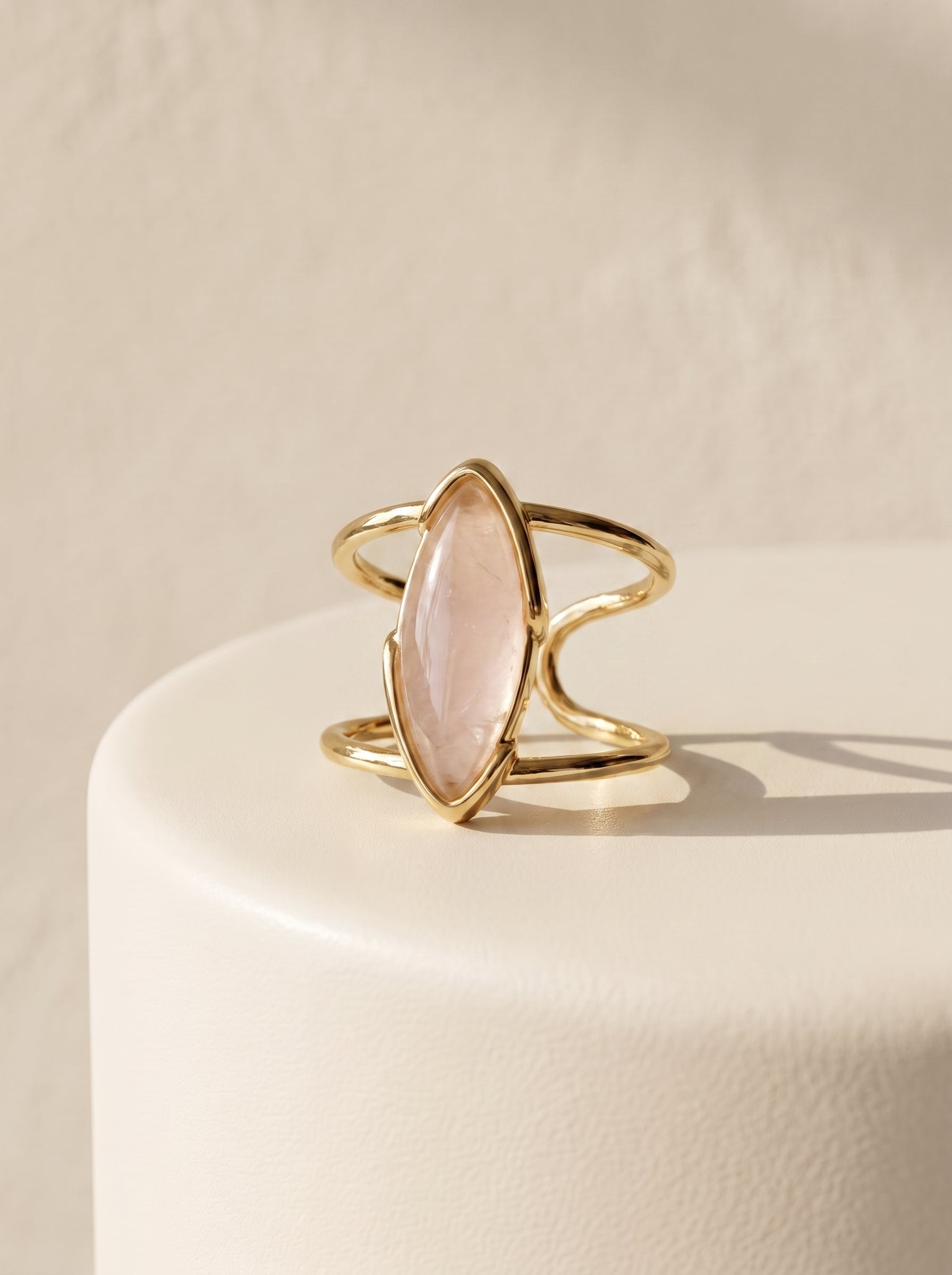StoneCraft Jewellery rose quartz marquise cuff ring gold plated front view on white surface