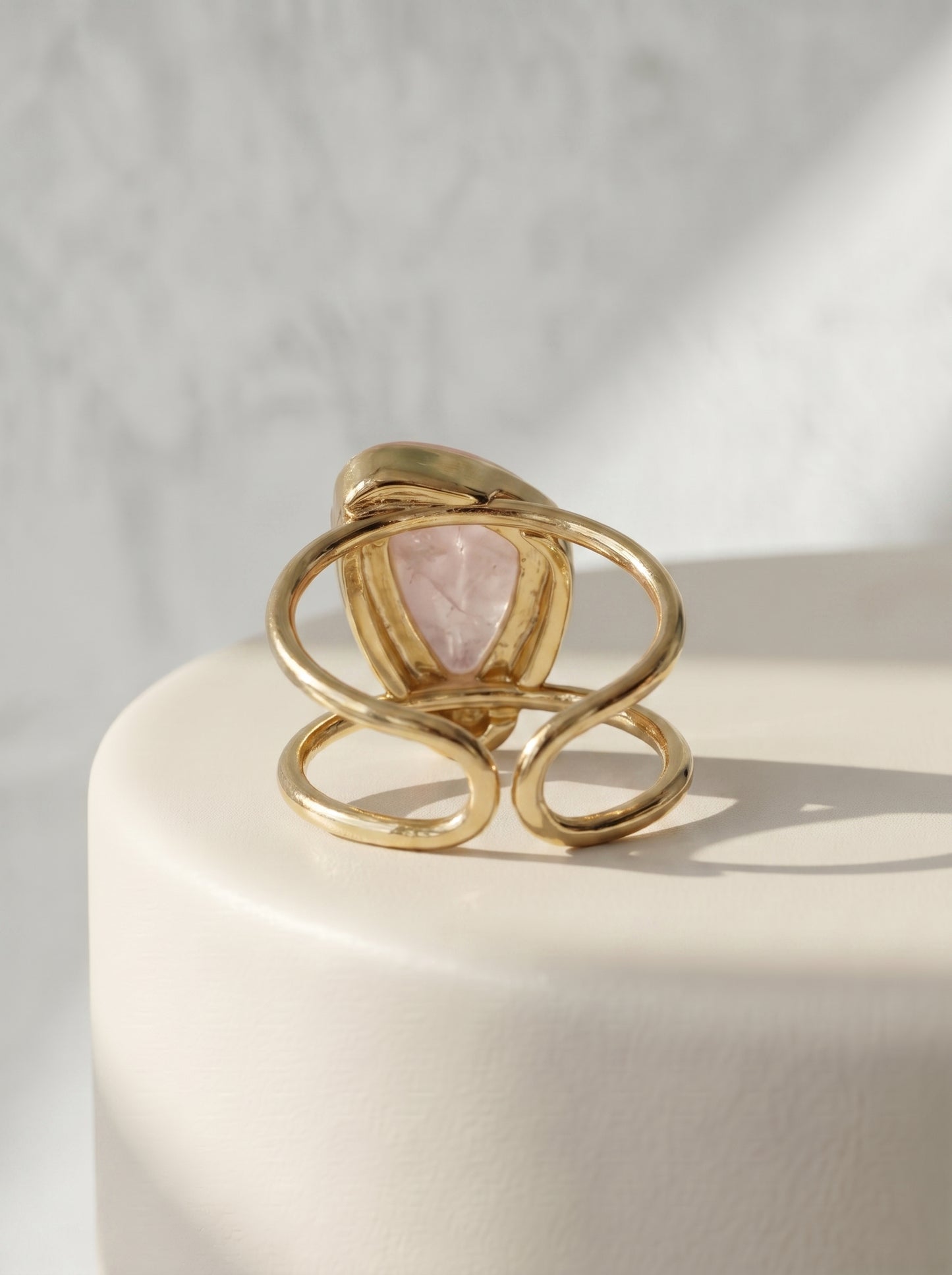 Underside view of rose quartz asymmetric cuff ring showing gold-plated double band structure – StoneCraft Jewellery