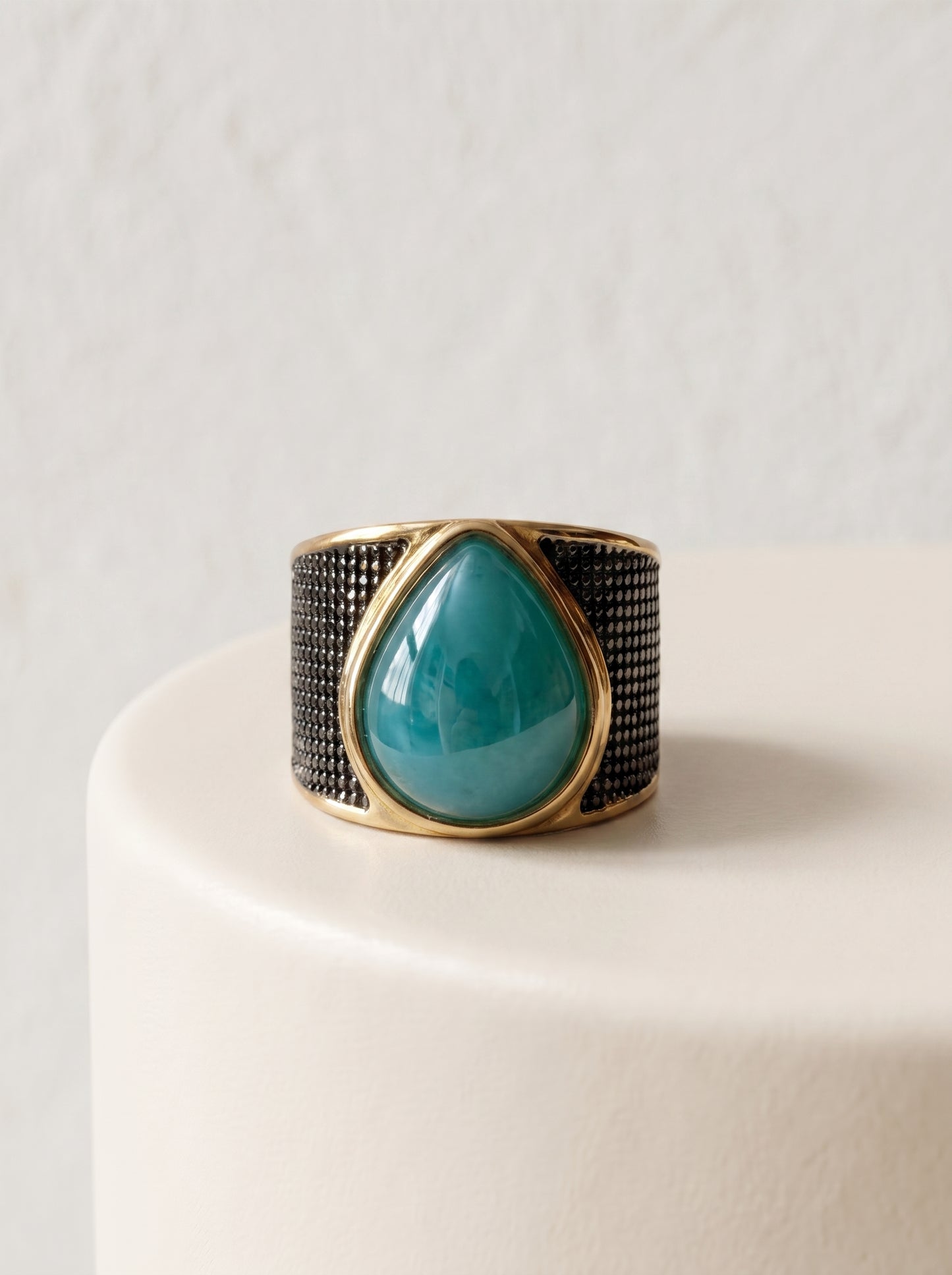 StoneCraft Jewellery green quartz teardrop wide band ring gold rhodium plated front view on white surface