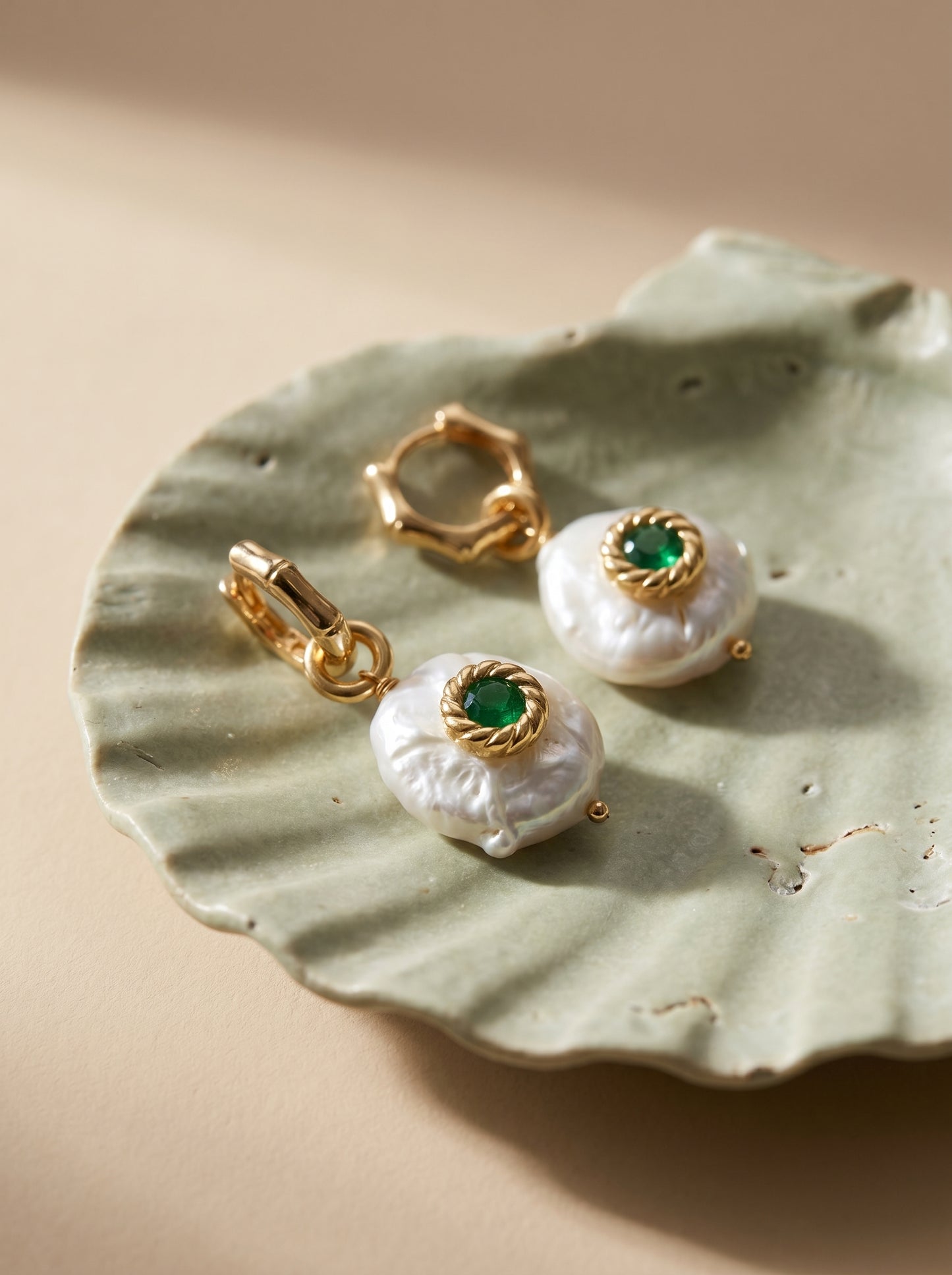 Gold-plated wave hoop earrings worn plain without pearl — minimalist everyday style