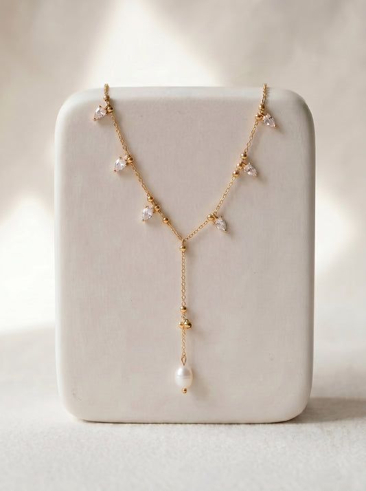 Crystal and pearl drop lariat necklace in gold-plated chain with baroque freshwater pearl pendant
