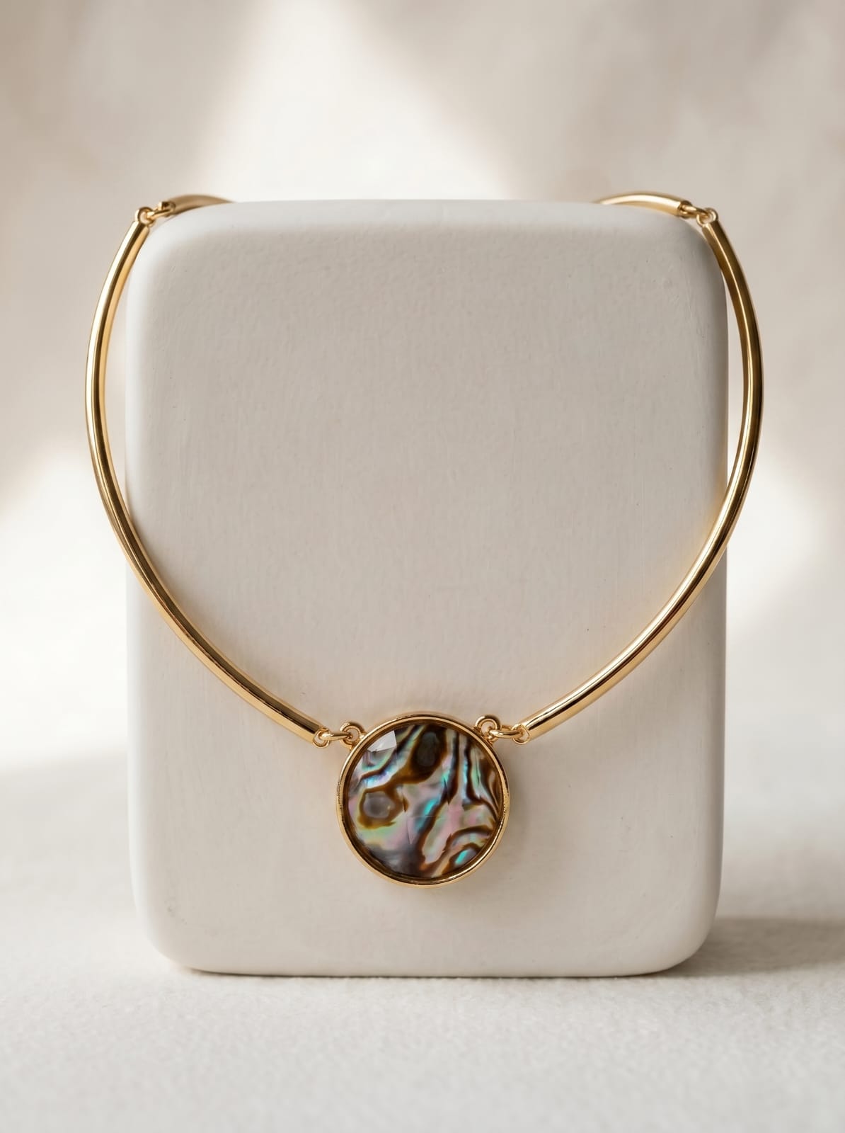 
Abalone choker necklace with round iridescent pendant in gold-plated bezel setting