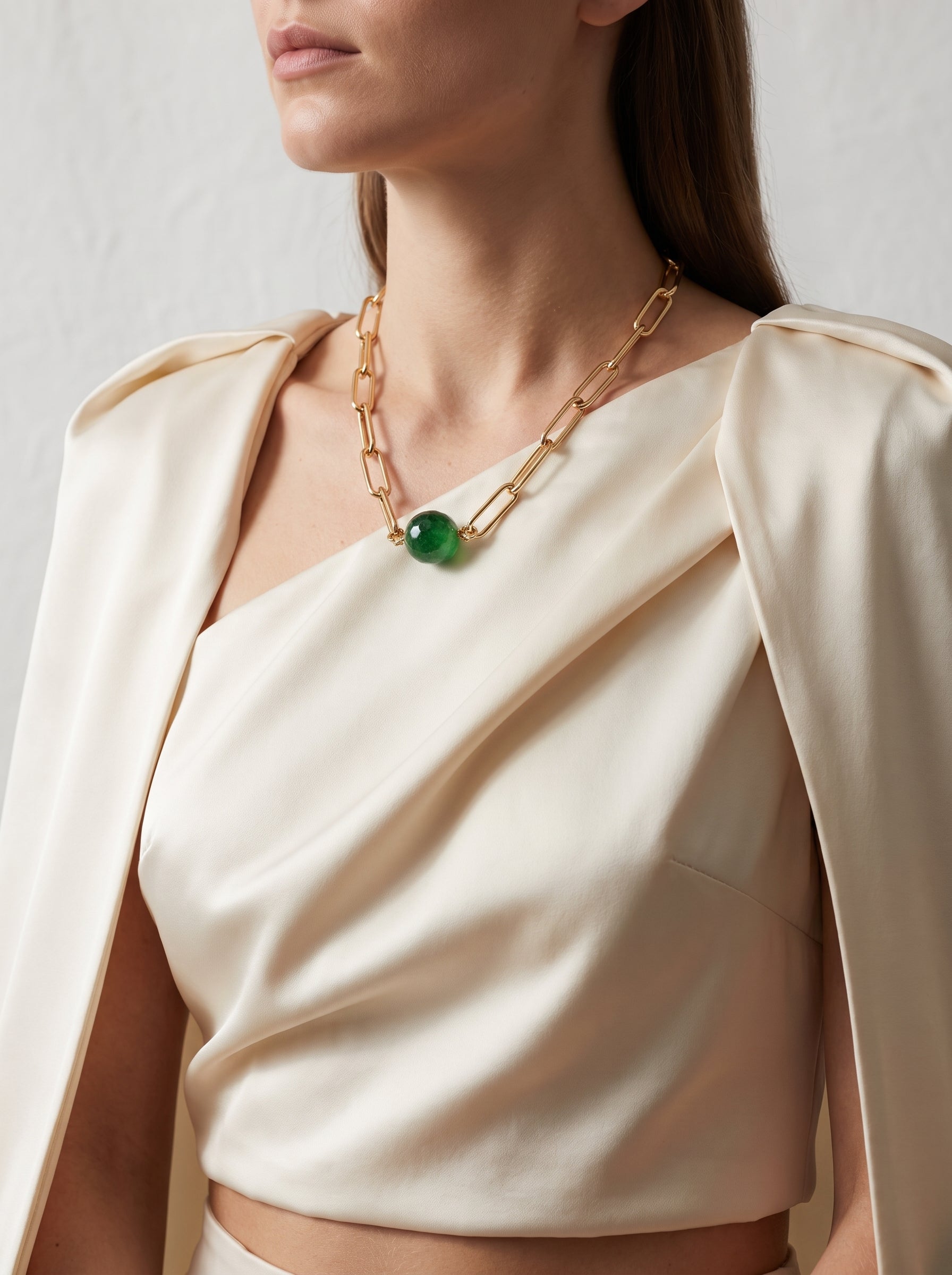 Green Jade Paperclip Chain Necklace laid on natural stone, close-up detail — StoneCraft Jewellery