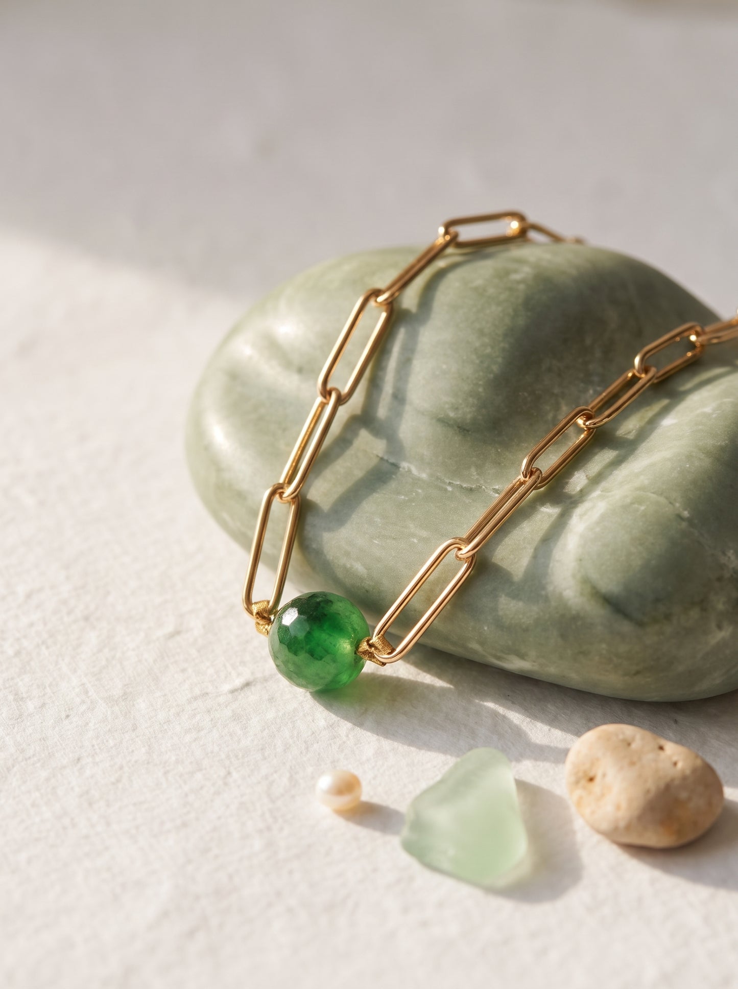 Green Jade Paperclip Chain Necklace flat lay on textured surface — StoneCraft Jewellery