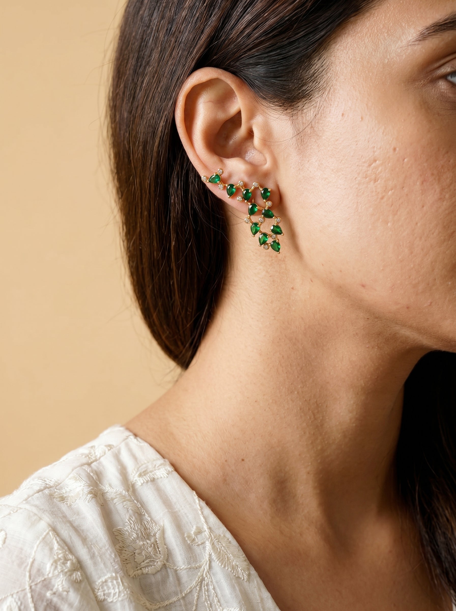 Gold tree branch stud earrings with green stone accents — StoneCraft Jewellery