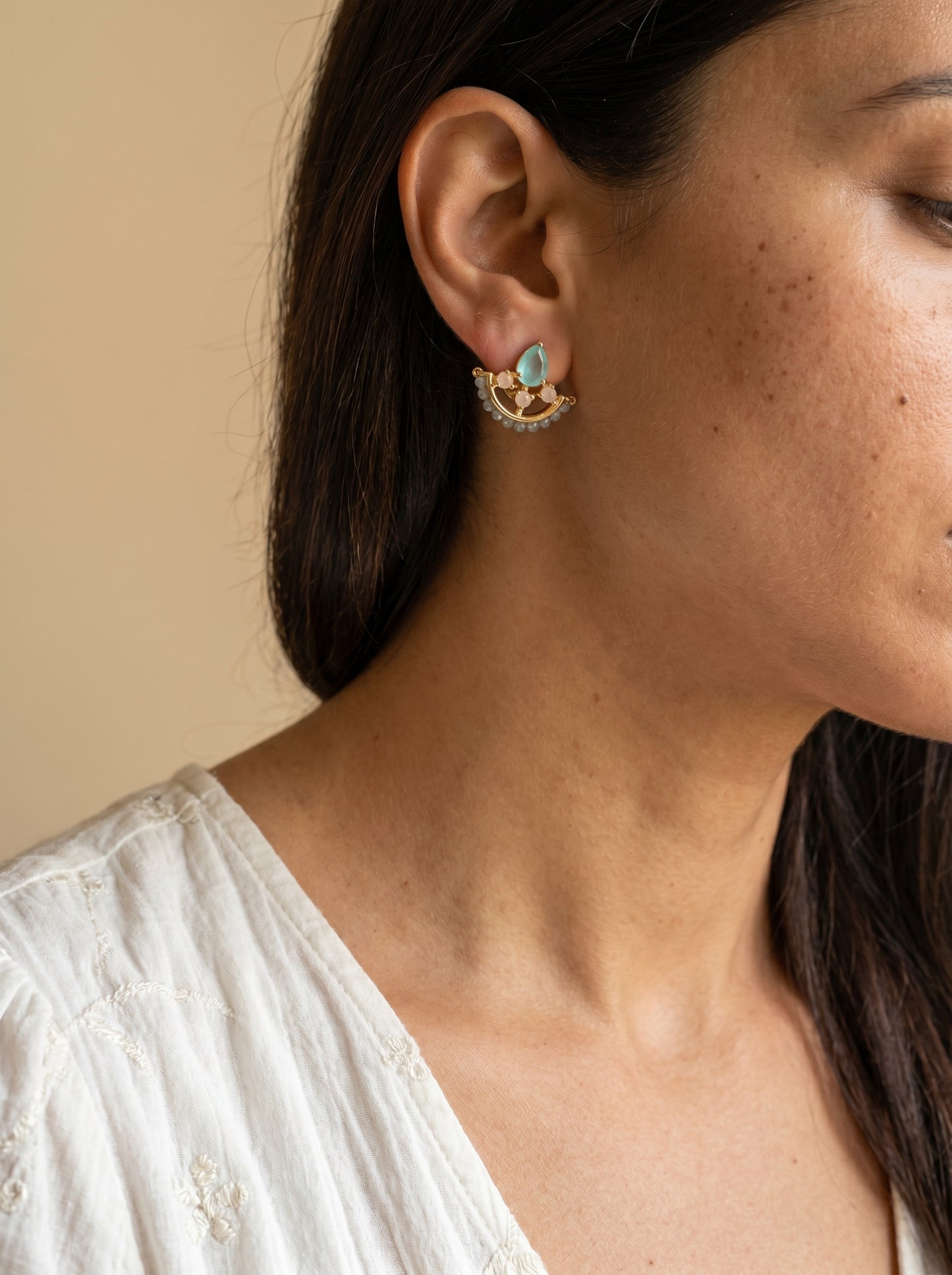 18K gold-plated teardrop aqua stud earrings lifestyle shot — StoneCraft Jewellery