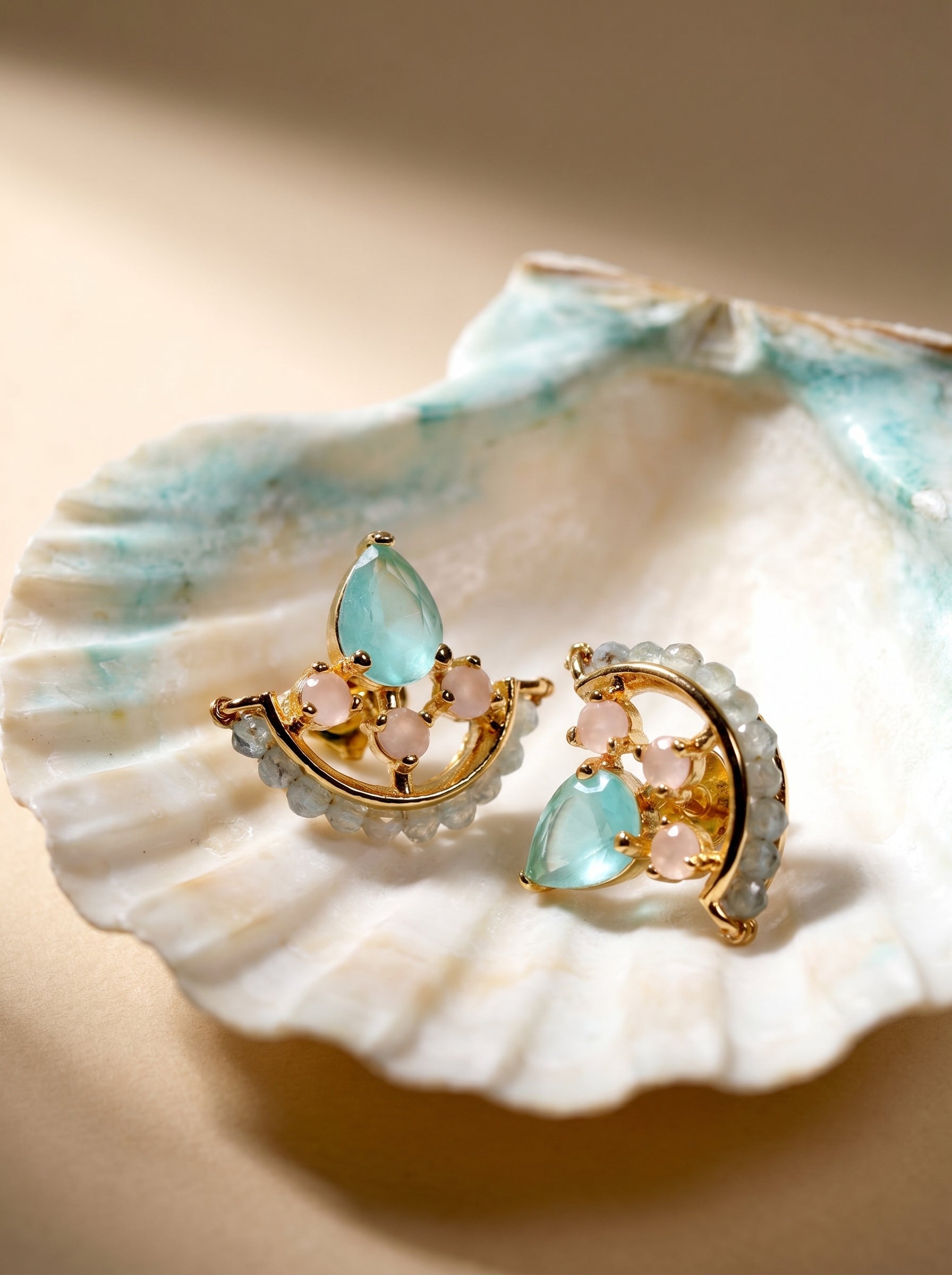 Light blue teardrop stud earrings with pink stone surround — StoneCraft Jewellery