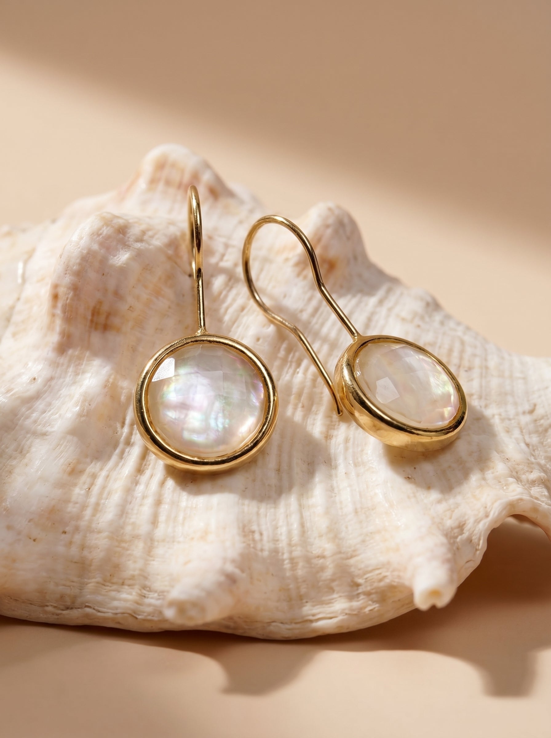 Mother of pearl hook earrings on model — StoneCraft Jewellery