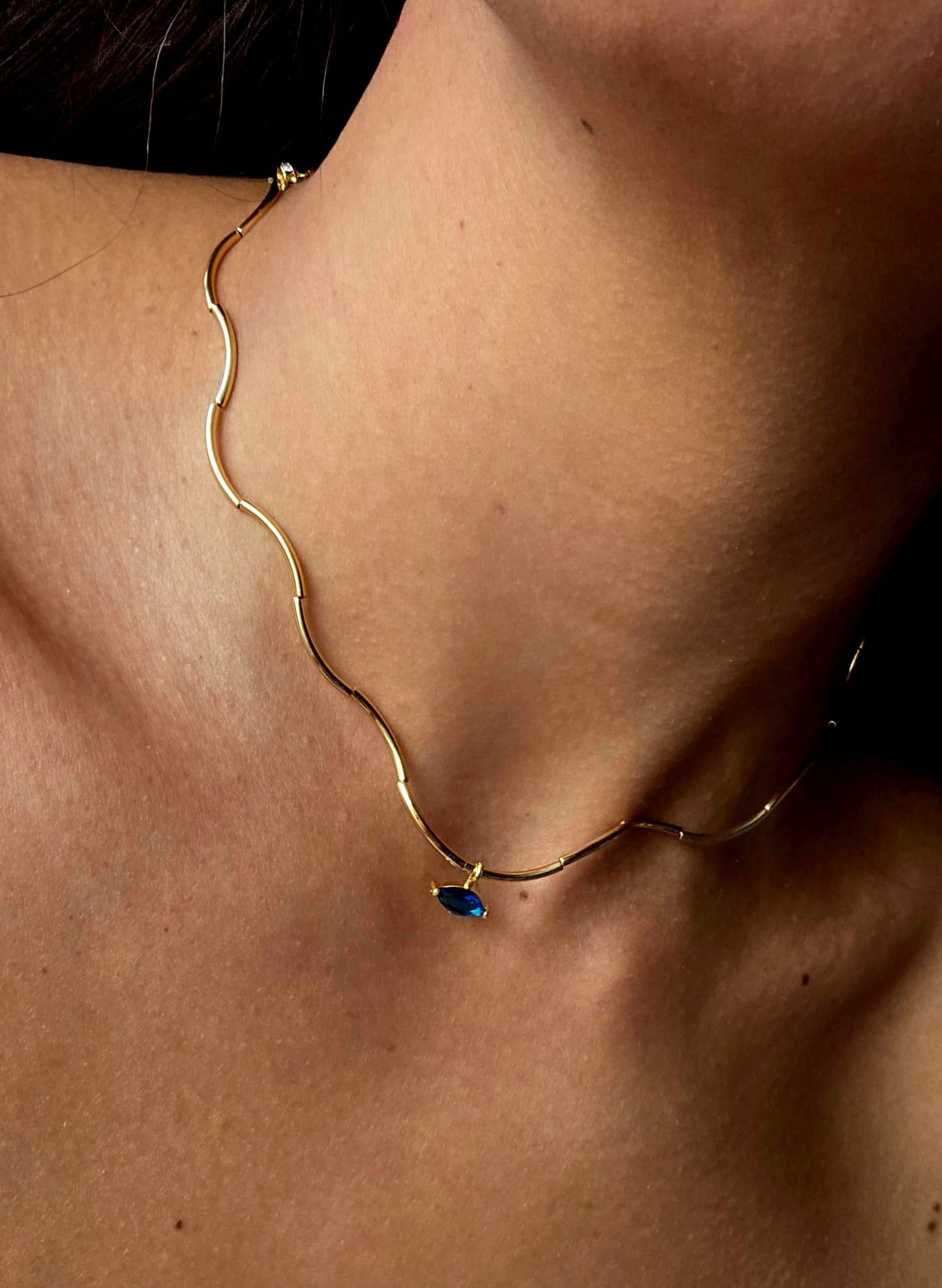 Gold Wave Chain Necklace with Blue Crystal Pendant
