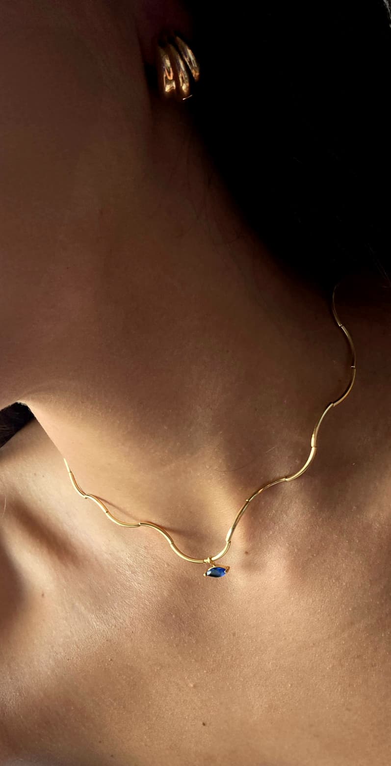 Gold Wave Chain Necklace with Blue Crystal Pendant