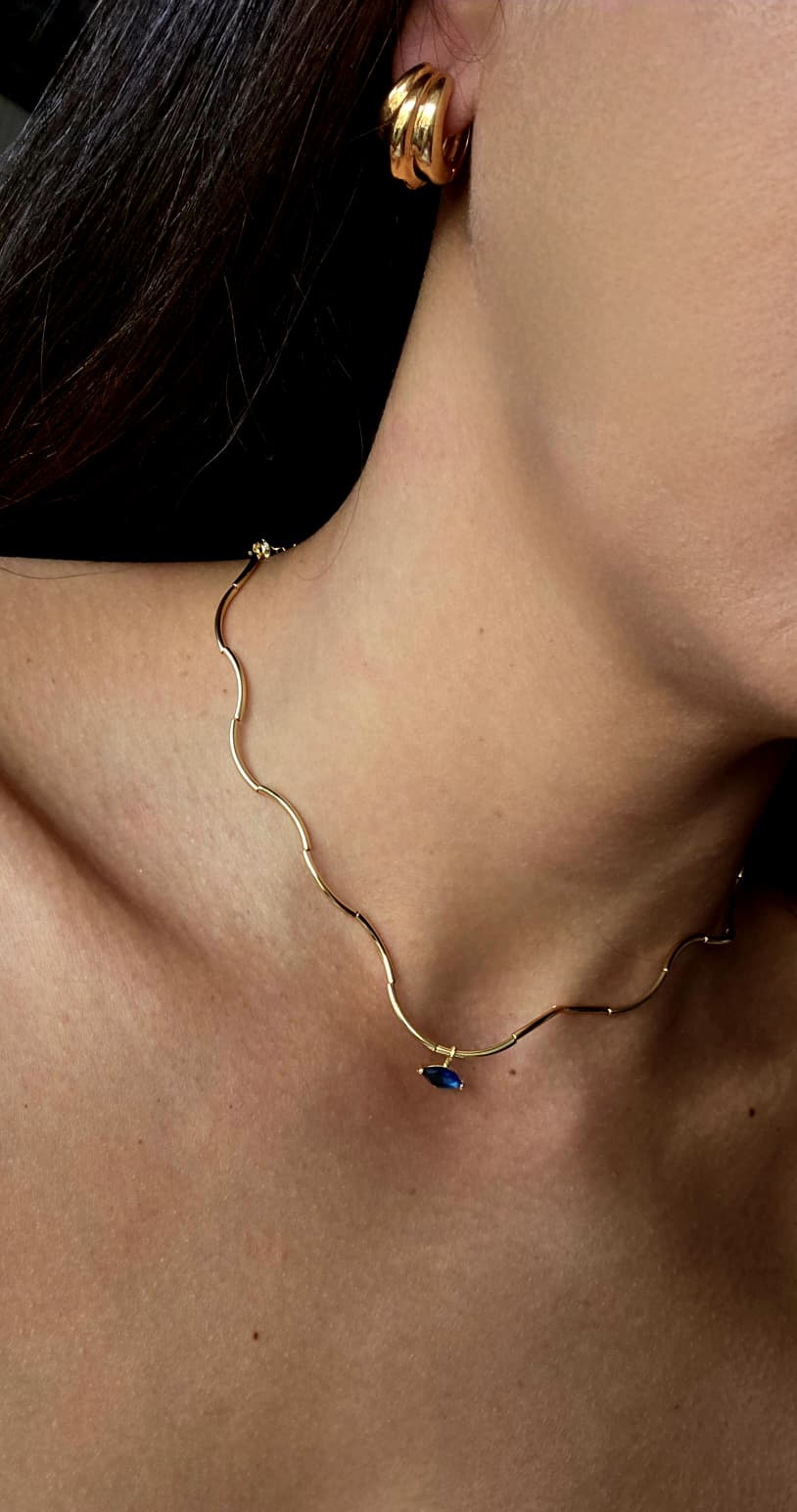 Gold Wave Chain Necklace with Blue Crystal Pendant