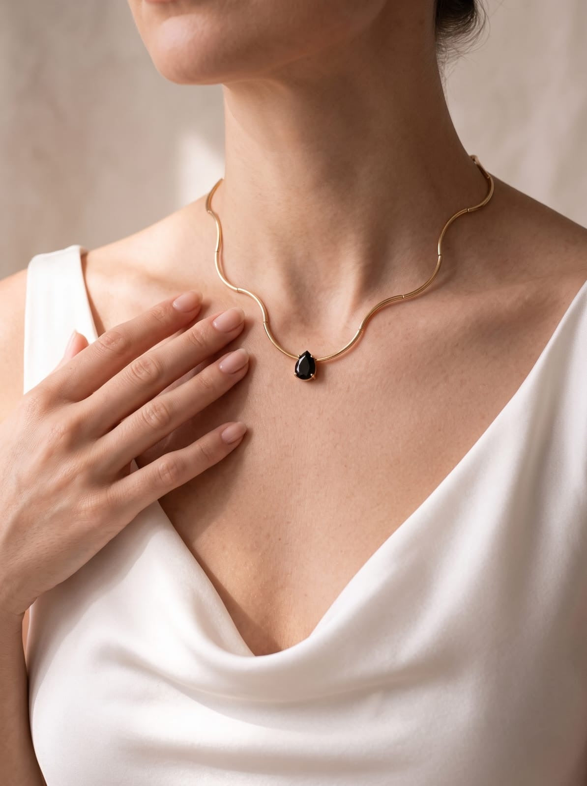 Gold Wave Chain Necklace with Black Teardrop Crystal Pendant