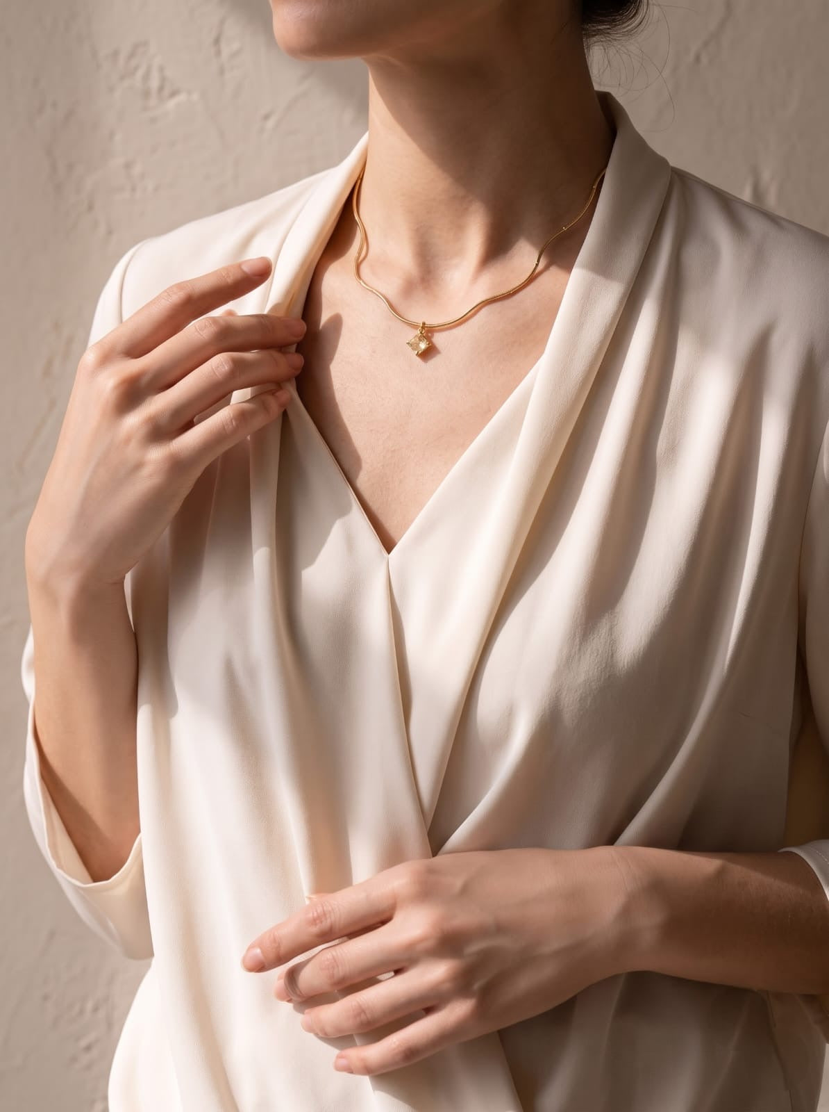 StoneCraft Jewellery gold wave chain necklace with a pale yellow square crystal pendant 